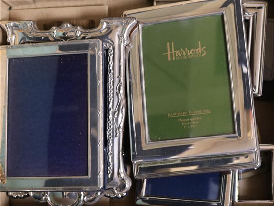 Eight assorted modern silver mounted photograph frames of varying sizes, largest 18.7cm.